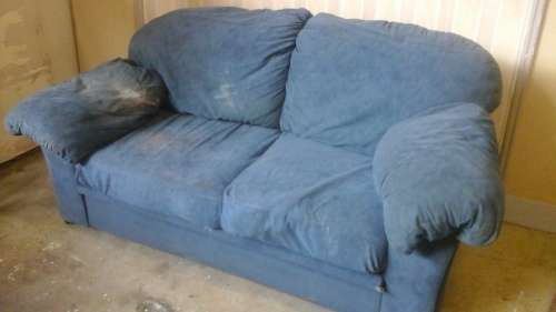 AWESOME AND COMFORTABLE TWO SEATER COUCH. COULD DO WITH RECOVERING STILL AWESOME & FUNCTIONAL!