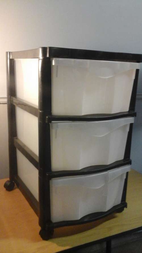 AWESOME QUALITY THREE DRAWER STORAGE UNIT ON WHEELS. GREAT FOR KEEPING ORGANIZED AND NEAT!