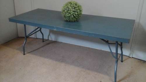 INCREDIBLE STEEL FOLD UP TABLE. AWESOME, STURDY AND USEFUL PIECE!