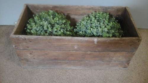 FANTASTIC WOOD LOOKING PLANTER. REALLY TERRIFIC AND USEFUL PIECE!
