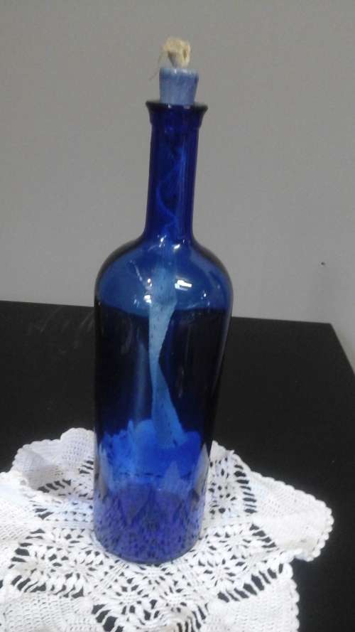 SIMPLY STUNNING BOTTLE SHAPED LANTERN. BEAUTIFUL AND HANDY PIECE!