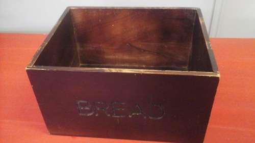 A PRACTICAL STORAGE BOX MARKED BREAD. USE IT FOR BREAD OR JUST AS A GENERAL STORAGE BOX