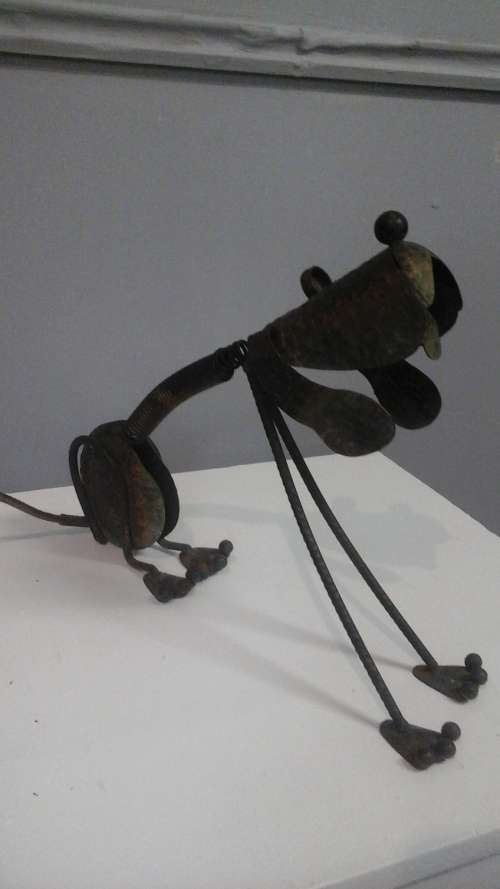 CUTE AND COLLECTIBLE. A PERFECT LITTLE STEEL DOG. THE HEAD EVEN BOUNCES