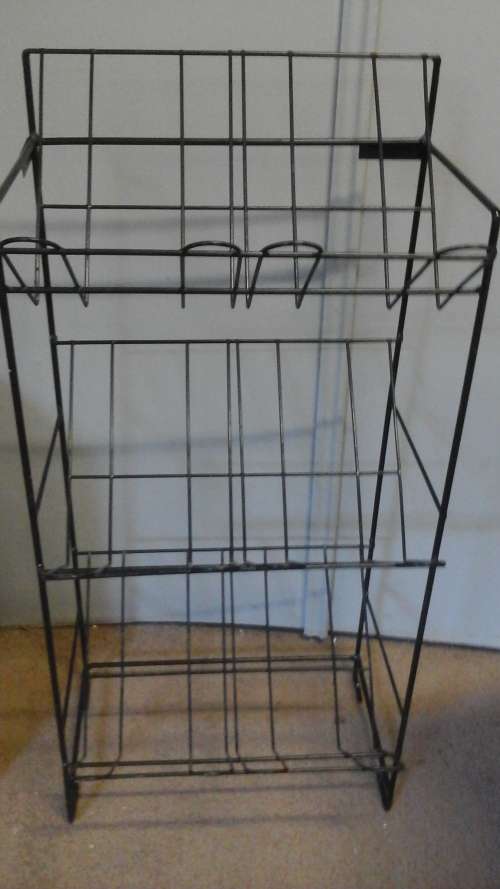WOW A TOTALLY UNUSUAL AND PRACTICAL STUNNING STEEL SHOES RACK. VERY HANDY SPACE SAVER