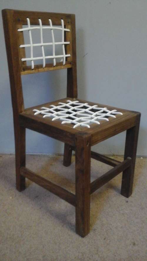 A HIGHLY COLLECTIBLE POSSIBLY KIAAT CHILDRENS RIEMPIE DINING ROOM CHAIR. A MUST HAVE