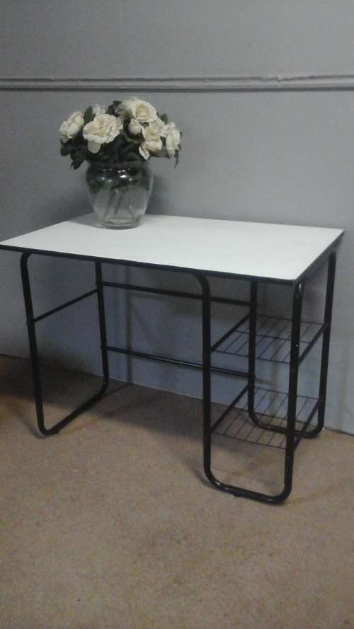 LOVELY AND COMPACT A LIGHT WEIGHT DESK OR STAND. BLACK AND WHITE IN COLOUR WOOD AND STEEL