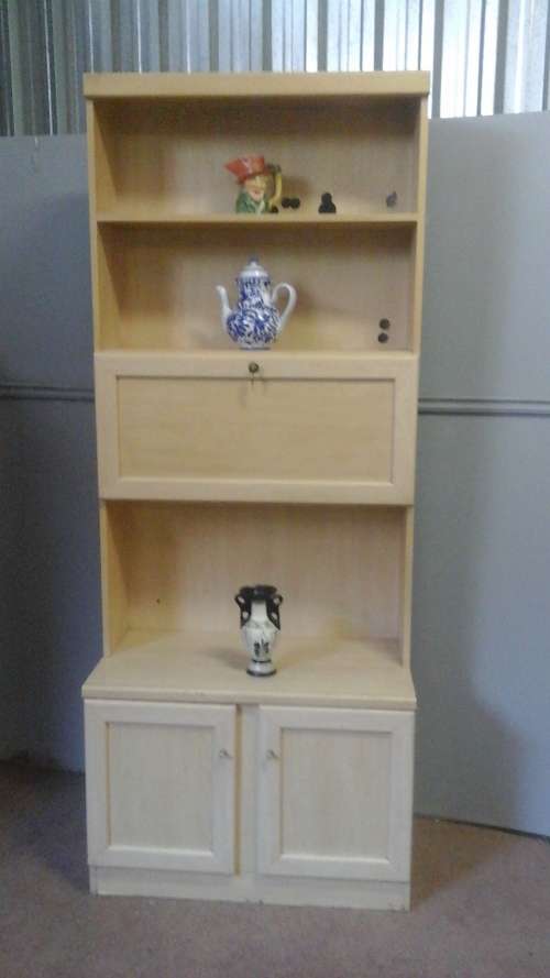 STRAIGHT FROM THE SEVENTIES A WOODEN BAR CABINET HAS SHELVES AND EVEN A CUPBOARD UNDERNEATH