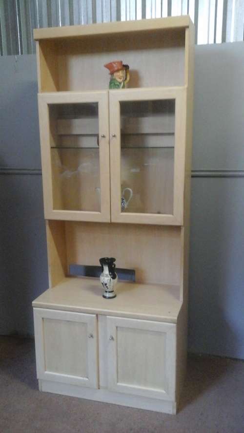 STRAIGHT FROM THE SEVENTIES A WOODEN DISPLAY CABINET HAS SHELVES AND CUPBOARDS
