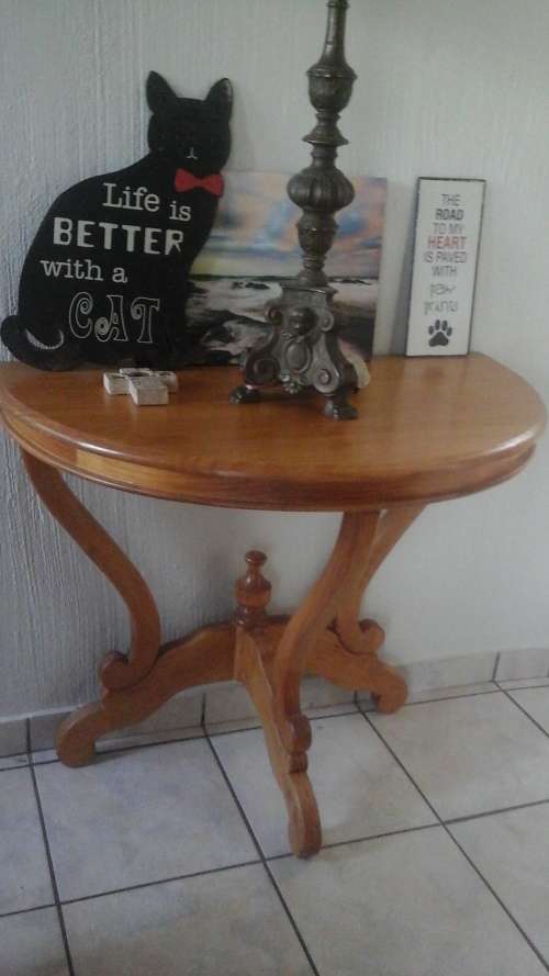 AN ABSOLUTELY UNUSUAL INTRICATELY CARVED HALF MOON TABLE. SUCH BEAUTIFUL DETAIL