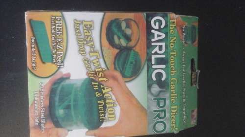 FANTASTIC GARLIC PRO. NO-TOUCH GARLIC DICER. HANDY AND AWESOME PIECE!