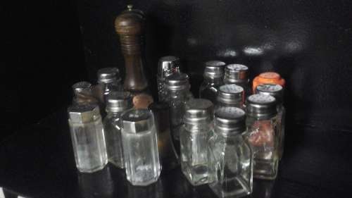 AWESOME ASSORTMENT OF SALT AND PEPPER SHAKERS. TERRIFIC AND USEFUL!