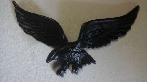 A HIGHLY COLLECTIBLE POSSIBLY ALUMINIUM EAGLE. HAS HOLES TO MOUNT IT WHERE YOU WANT