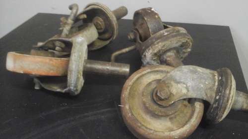 A VERY USEFUL SET OF SCAFFOLDING WHEELS.  A HEAVY DUTY SET AND APPEARS TO HAVE BRAKES
