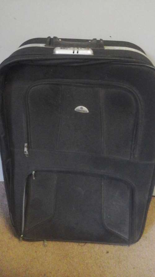 FANTASTIC KIKA ADVANCED TRAVEL BAG.  IT IS BLACK AND GREY IN COLOR. TATTY BUT TERRIFIC FOR STORAGE!