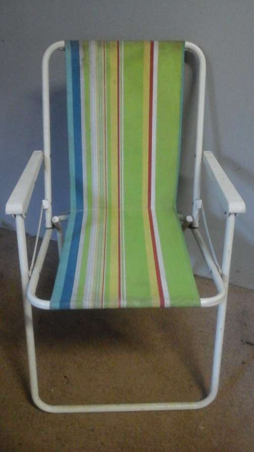 PERFECTLY PRACTICAL A LIGHTWEIGHT FOLD UP CHAIR. NICE AND COMPACT TAKE IT WHEREVER YOU GO