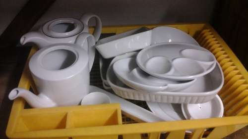 FANTASTIC JOB LOT OF ASSORTED WHITE PORCELAIN IN A YELLOW DISH RACK.  TERRIFIC AND USEFUL SET!