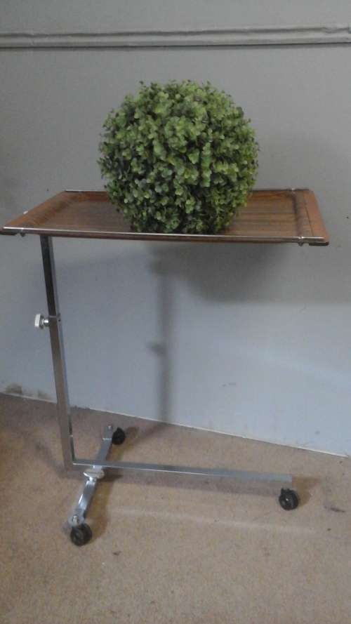 AN ABSOLUTELY AMAZING FULLY ADJUSTABLE VINTAGE BED TABLE. PERFECT FOR USE BY AN INVALID