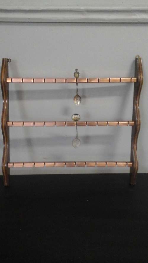 AWESOME WOOD AND COPPER PLATTED SPOON WALL RACK. TAKES 36 SPOONS. FANTASTIC PIECE!