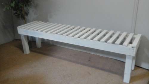 A BRILLIANT AND FUNCTIONAL SLATTED SHABBY SHICK GARDEN BENCH. USEFUL FOR THE GARDEN OR A PATIO