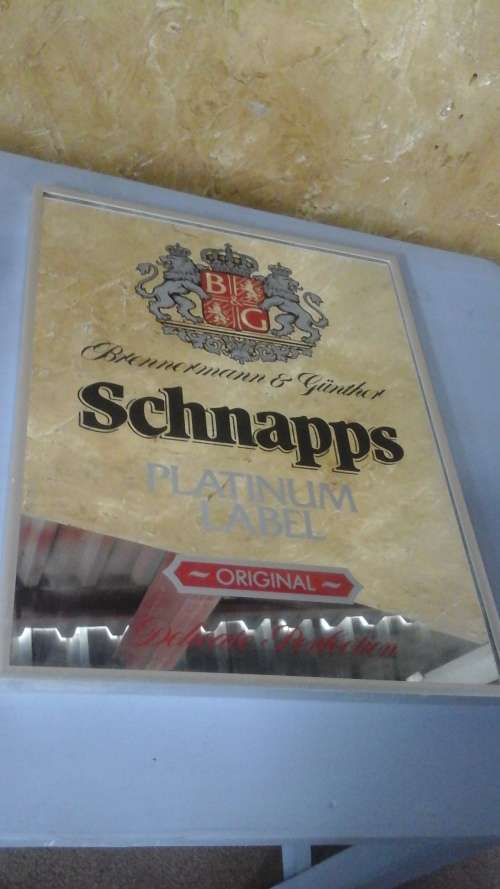 AMAZING FRAMED PICTURE ON MIRROR PROMOTING BRENNERMANN & GUNTHER SCHNAPPS. AWESOME!