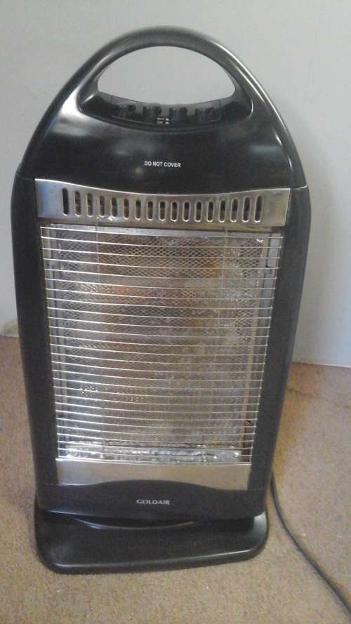 EXACTLY WHAT YOU NEED FOR THIS WEATHER. A GOOD AS NEW FULLY FUNCTIONAL GOLDAIR HEATER