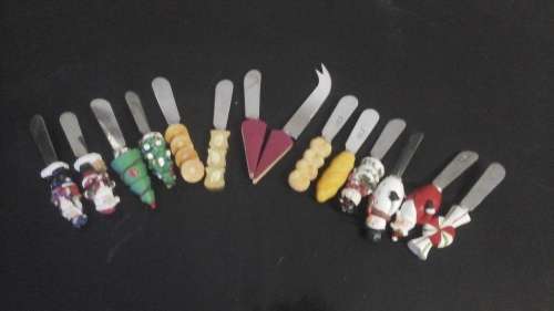 FANTASTIC ASSORTMENT OF 13 BUTTER KNIVES AND 1 CHEESE KNIFE. TERRIFIC AND COLLECTIBLE SET!