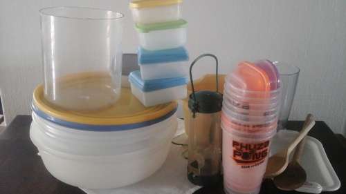 SOME PRACTICAL AND HANDY PLASTIC KITCHEN ITEMS. BOWLS AND CONTAINERS EVEN A BIRD FEEDER