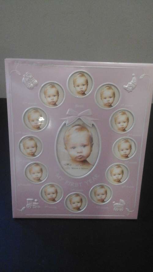 ADORABLE 'MY FIRST YEAR' PHOTO FRAME FOR A LITTLE GIRL.ABSOLUTELY STUNNING PIECE!
