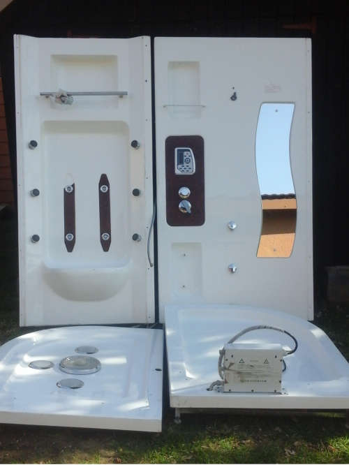 WOW!!  A COMPLETE SHOWER ENCLOSURE. INCLUDING ROOF, PAN AND DOOR. THIS ONE STEAMS AND HAS MUSIC