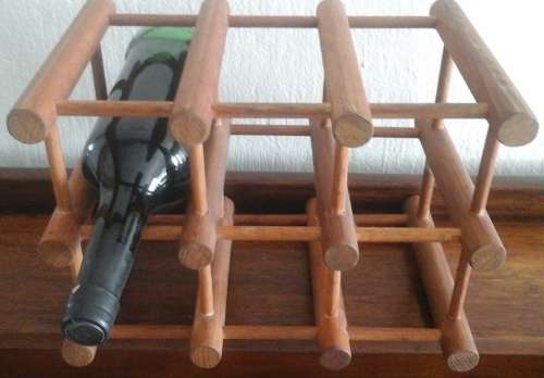 SIMPLY TERRIFIC WOODEN WINE RACK. FITS 6 BOTTLES. AWESOME & FUNCTIONAL PIECE!