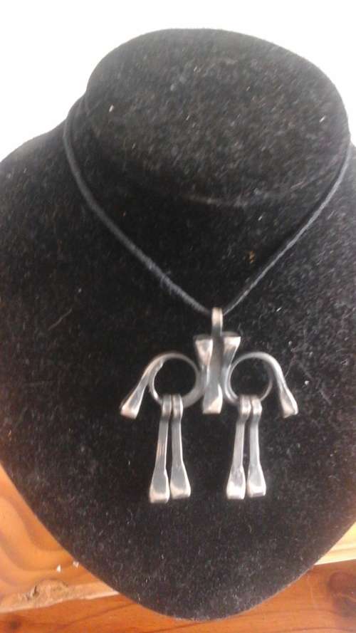 GORGEOUS PATTERN SHAPED NECKLACE. MADE FROM VINTAGE HORSESHOE NAILS. BEAUTIFUL & UNUSUAL PIECES!