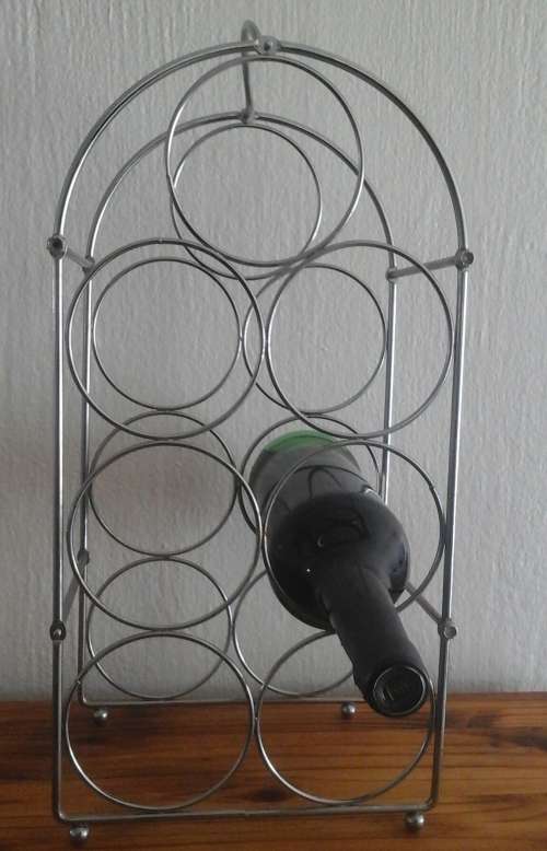 INCREDIBLE CHROMED WINE RACK. STUNNING PIECE!