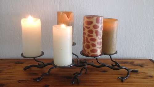 MAGNIFICENT WROUGHT IRON BRANCH SHAPED CANDLE HOLDER. GORGEOUS AND FUNCTIONAL PIECE!