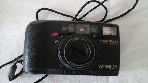 PERFECT ORNAMENT OR BACK DROP A MINOLTA RIVA 100 AF DROP IN CAMERA WITH RED EYE REDUCTIOIN