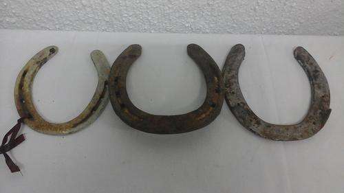 COLLECTION OF THREE ORIGINAL VINTAGE HORSE SHOES.SO AMAZING TO BE BELIEVE THEY WHERE ONCE ON A HORSE