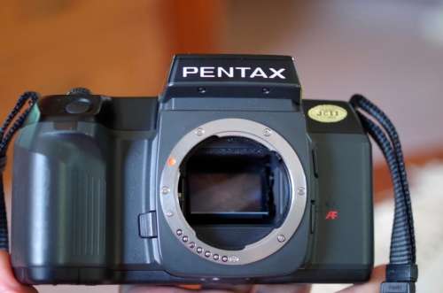 3 x 35mm slr film bodies, canon EOS 500N canon EOS 500 Pentax SF 10. 1 bid for all