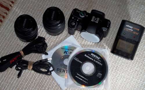 Pentax KM with two lenses, 18-55 and 50-200