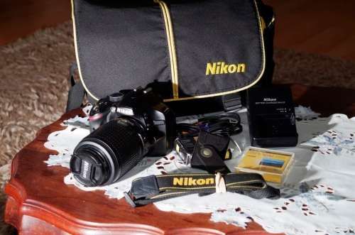 Nikon D3200 with 55-200 vr lens, bag, 16 gig card, remote, original battery and charger