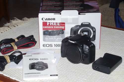 Canon 100D body only in excellent condition, photos show exactly whats on sale, low shutter count.
