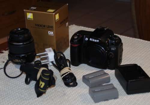 Nikon D80 with 18-55 lens, 2 batteries , photos show exact kit on sale.