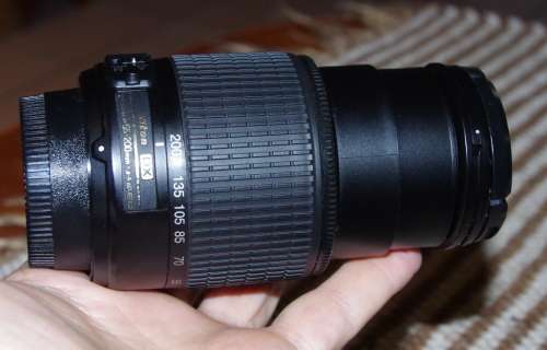 Nikon 55-200 DX lens with front and rear caps, good working condition. Photos are of lens on sale.