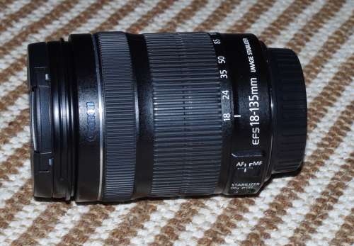 Canon 18-135 IS STM in good condition, caps included, photos show exact lens on sale.