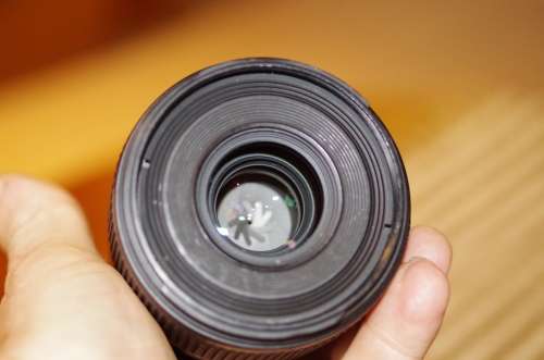 Nikon 60mm 2.8. this lens has signs of use as shown itn the photos, works 100%,