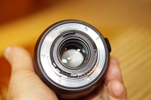Nikon 60mm 2.8. this lens has signs of use as shown itn the photos, works 100%,