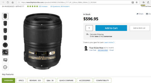 Nikon 60mm 2.8. this lens has signs of use as shown itn the photos, works 100%,