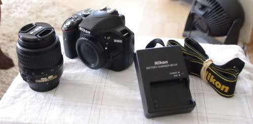 Nikon D3300 with 18-55 lens, photos show exact item on sale, top condition low shutter count.