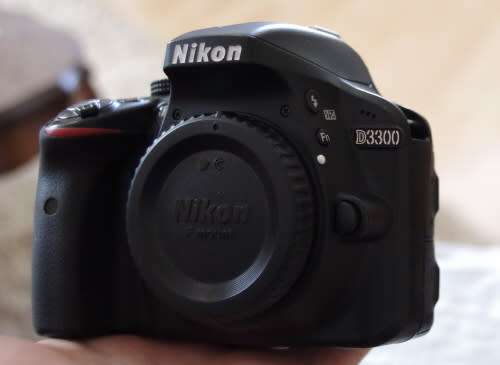 Nikon D3300 with 18-55 lens, photos show exact item on sale, top condition low shutter count.