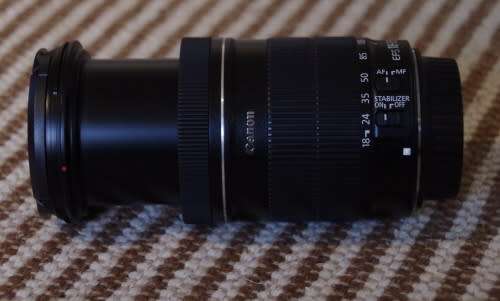 Canon 18-135 IS photos show exact item on sale, excellent condition.