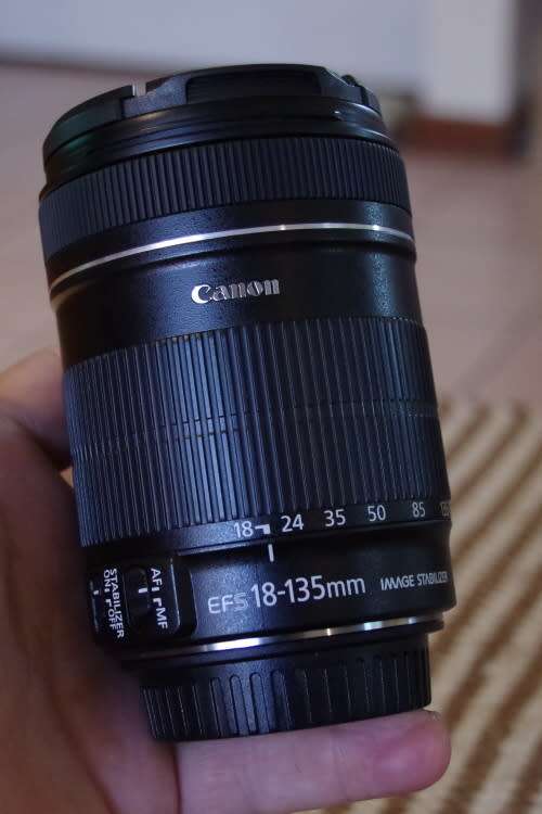 Canon 18-135 IS photos show exact item on sale, excellent condition.