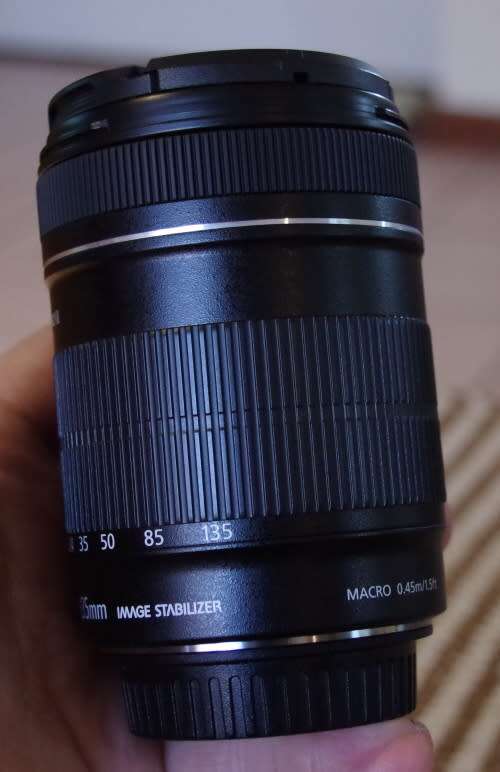 Canon 18-135 IS photos show exact item on sale, excellent condition.